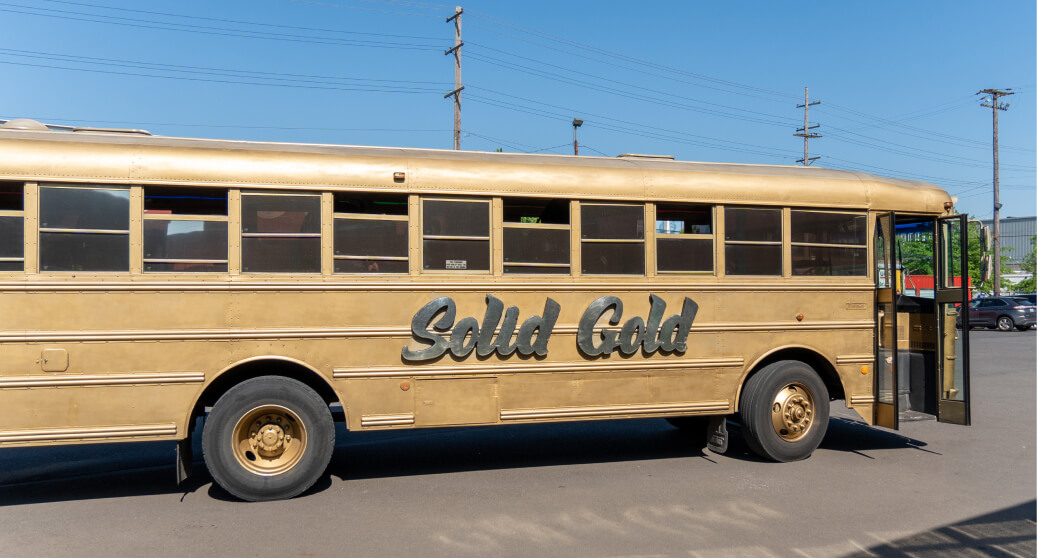 Portland local eco-friendly event transportation option Solid Gold Bus